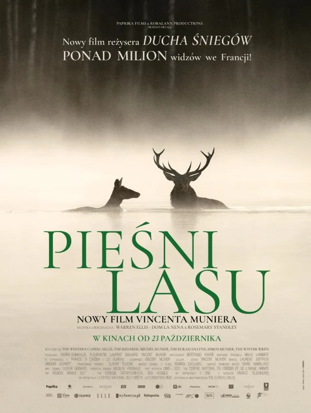 plakat. we mgle widoczne sylwetki jelenia i łani